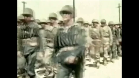 1942 - During basic training, new recruits load railway cars with vehicles and Stock Footage 85200930