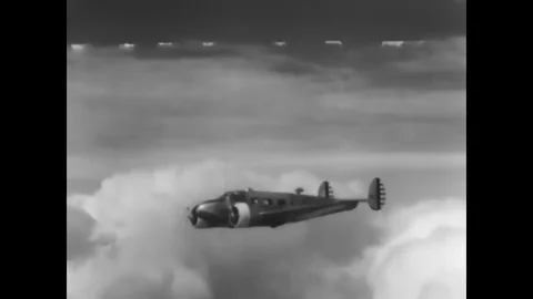 1942 - An oil gauge indicates a drop in pressure and a navigator plans an Stock Footage