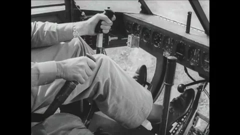 1942 - A US Army Air Force pilot demonstrates how to control the throttle of a Stock Footage 155855053
