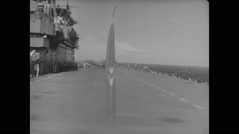 1942 - US Navy stealth planes take off from an aircraft carrier and go on dive Stock Footage 166833682