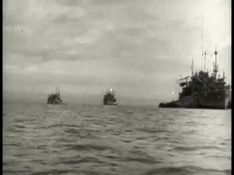 1943 _ American soldiers arrive by boat to fight in the South Pacific during Stock Footage