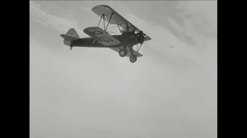 1943 - An air force pilot (William Holden) breezes through a basic training solo Video stock 83423099