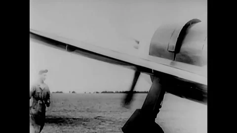 1943 - A camera mounted in the wing of a warplane produces footage of aerial Stock Footage 79447181