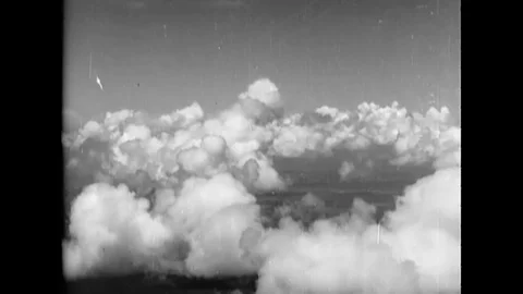 1943 - Curtiss SB2C Helldivers are seen flying in formation. Stock Footage 100557519