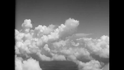 1943 - Curtiss SB2C Helldivers are seen flying in formation. Stock Footage 100557523