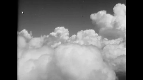 1943 - Curtiss SB2C Helldivers are seen flying in formation. Stock Footage 100557531