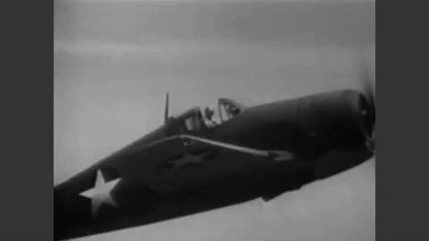 1943 - A Navy pilot demonstrates how to recover when your F6F Hellcat stalls Stock Footage 90439201