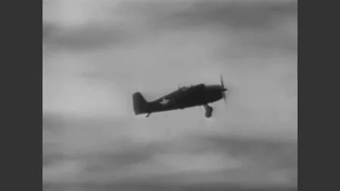 1943 - A Navy pilot demonstrates how to recover when your F6F Hellcat stalls Stock Footage 90439202