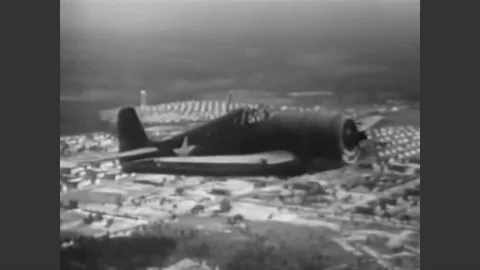 1943 - The pilot of an F6F Hellcat goes through his checklist of things to do Stock Footage 90467157