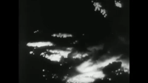 1944 - The 21st Bomber Command bombs Tokyo, Japan at night in World War 2. Stock Footage