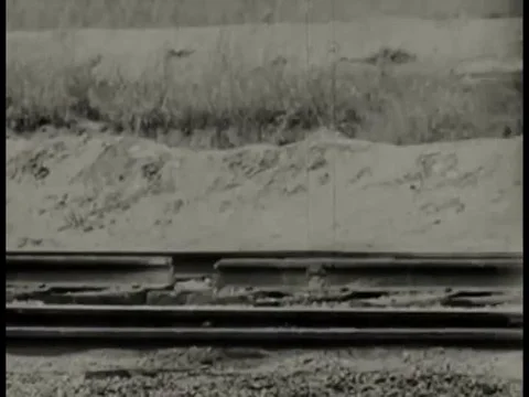 1944 _ A train fails to derail after rolling over a multiple gaps in a track Stock Footage