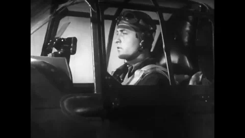 1944 - An Air Force pilot is shot down and parachutes into water. Video stock 103865699