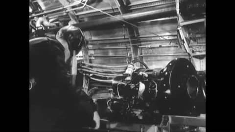 1944 - A B-29 pilot checks his switches, levers, and throttles before flight. Stock Footage 90403885