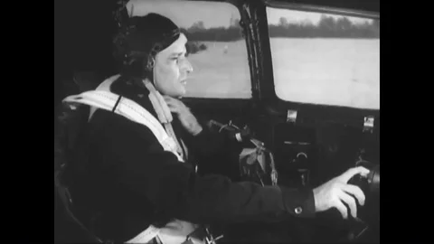 1944 - A B-29 pilot makes his final checks before starting the engine. Stock Footage 90403891