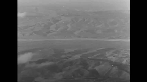 1944 - Bombs fall during the bombing of Cassino, Italy, and explode. Stock Footage 232892853