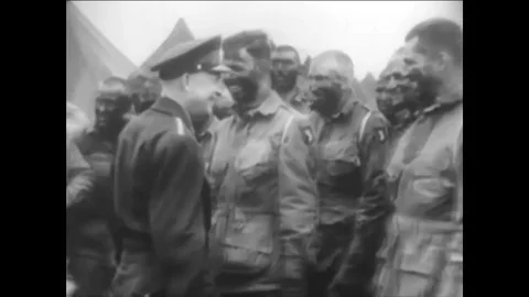1944-Dwight D Eisenhower meets with a group of paratroopers before a mission Stock Footage 86824262