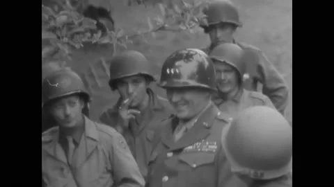 1944 - General Patton addresses war correspondents in the French countryside. Stock Footage 232851405