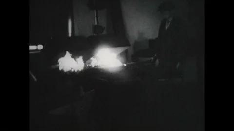 1944 - German Jews work as blacksmiths and a welder is shown at Westerbork Stock Footage 86575708
