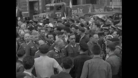 1944 - German POWs are gathered in Paris. French civilians of all ages and Stock Footage 173397424