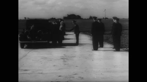 1944 - King George VI, the Queen Mother, and Princess Elizabeth visit allied Stock Footage 172584940