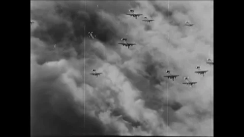 1944 - One plane is shot down when an American squadron bombs military Stock Footage 87150206