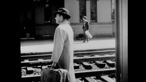 1944 - An OSS agent boards a train behind enemy lines. Video stock 92626265