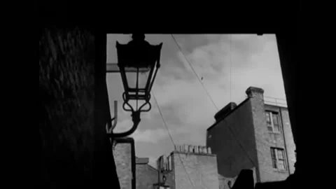1944 - People looking up for approaching V-1 bombs. A bomb explodes. Scenes in Stock Footage 221833543