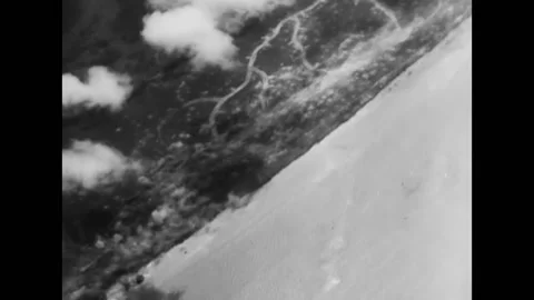 1944 - A US Army Air Force airman must bail out by parachute after a bombing Stock Footage 159146867