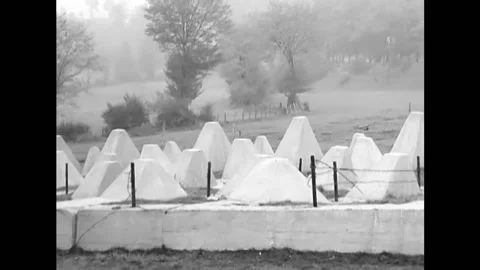 1944 - US Army engineers place dynamite charges on the dragons' teeth of the Stock Footage 164529395
