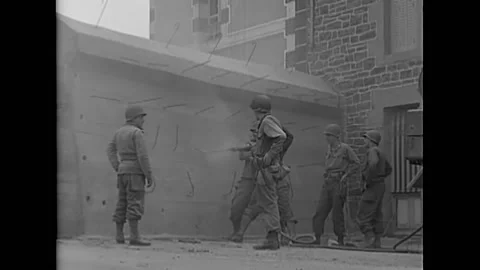 1944 - US Army engineers prepare to demolish a tank barrier with explosives. Stock Footage 203713183