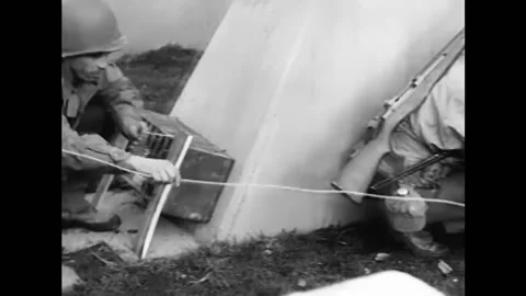 1944 - US Army engineers set up explosive charges along the dragons' teeth of Stock Footage 164529620