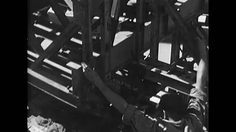 1944 - US Army engineers use rollers to fix portions of the Bailey Bridge, which Stock Footage 203712950