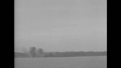1944 - US Navy forces shell the French coast. Stock Footage 226614936