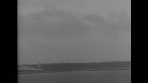 1944 - US Navy gunners attack the French coast. Stock Footage 226614595