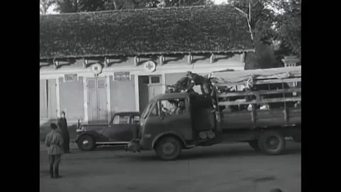 1944 - Vehicles of the French Forces of the Interior drive through Paris, Stock Footage 173402896