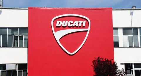 Headquarters of Ducati with big logo on the wall. Ducati is a famous Italian motorcycle manufacturing company. Bologna, Italy xkwx ducati, motorcycle, speed, race, motorbike, sport, motor, bike, transportation, transport, vehicle, fast, engine, moto, international, italian, technology, superbike, design, exhibition, illustrative editorial, racing, team, wheel, bologna borgo panigale, drive, motogp, championship, motorsport, modern, road, headquarters, competition, business, luxury, sbk, manufacturing company, expensive, show, event, made in italy, action, display, track, power, machine, metal, red, circuit, model