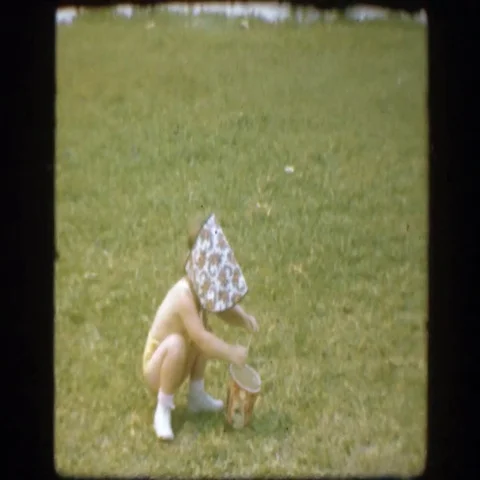1945: Cute Topless Daughter Playing With Father Outside Florida Stock Footage 69445059