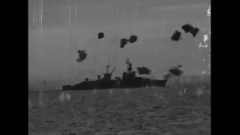 1945 - An enemy plane crashes into the USS Louisville, causing a mass explosion. Stock Footage 112537505