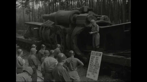 1945 - General Patton is seen inspecting the world's largest gun in a German Stock-Footage 85646220