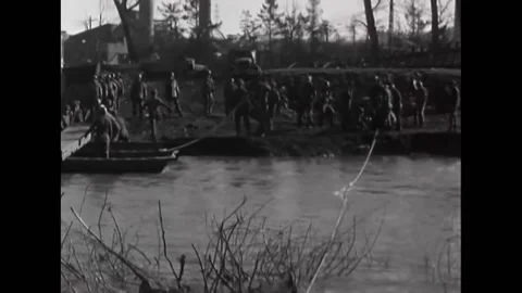 1945 - Men of the 237th Engineer Battalion begin building an infantry assault Stock Footage 226611304