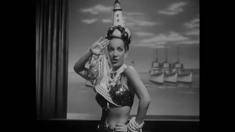 1945 - In this musical, Carmen Miranda performs "She Was Always True to the 動画素材 246358364