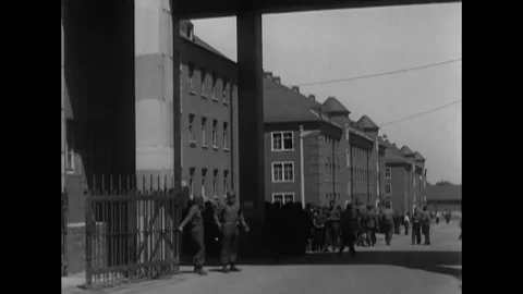 1945 - A Russian flag flies over the former German run Camp Brand. Stock Footage 205600338