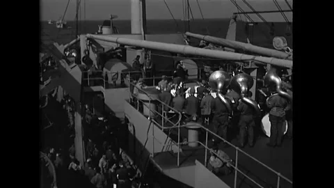 1945 - Troops aboard the USS General Gordon enjoy a concert by a US Navy band. 스톡 동영상 106036512