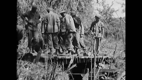 1945 - US Army engineers complete a bridge in Luzon, the Philippines, allowing 스톡 동영상 172582286