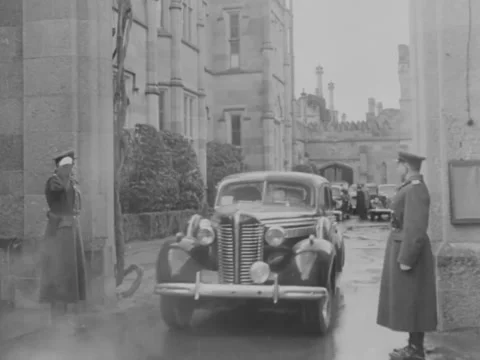 1945 - Yalta: Motorcade pulls out of Vorontsov Palace Stock Footage 221434722