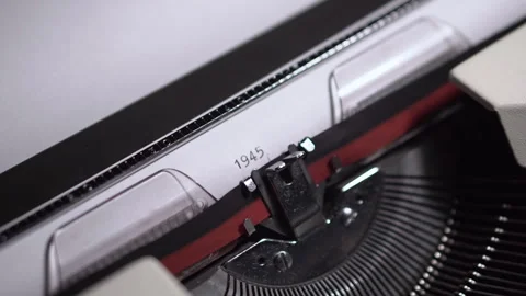 1945 Year Number, Typing on White Paper in Vintage Typewriter Stock Footage 274129557