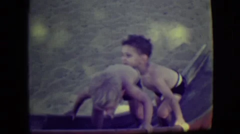 1946: 2 kids at the beach LAS VEGAS, NEVADA Stock Footage