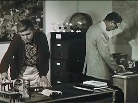 1946 _ Welders join metal and finish seams with flux during the creation of the Stock Footage