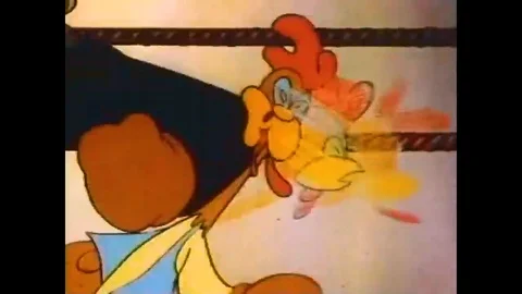 1946 - In this animated film, a mouse helps a scrawny rooster defeat a tough Stock Footage