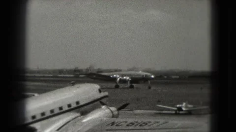 1946: large airplane with four propellers moves down the landing strip Stock Footage